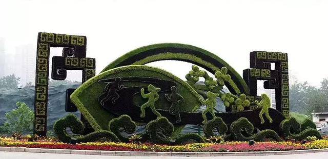四川德阳大运会运动造型绿雕成都国庆绿雕图片