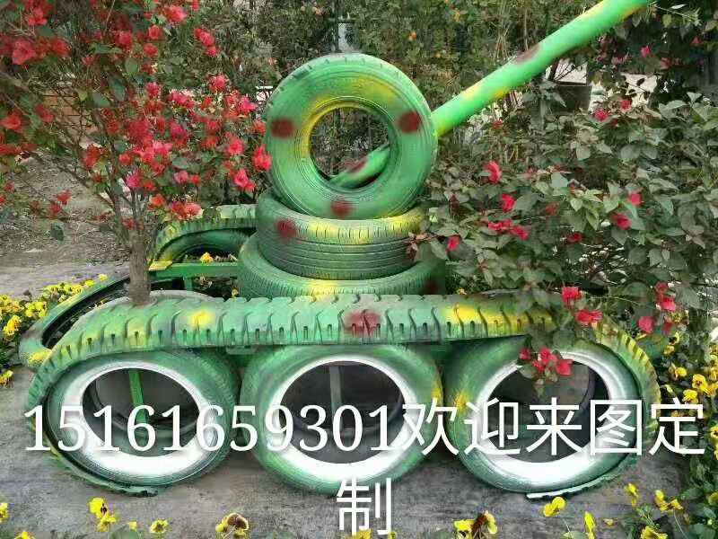 稻草人工艺品造型图片轮胎工艺品定制仿真绿雕牛