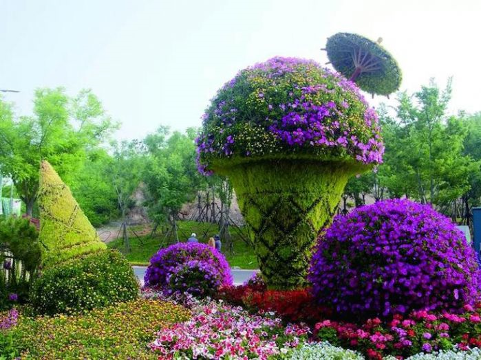 四川乐山绿雕景观花柱花墙造型成都市仿真绿雕厂家