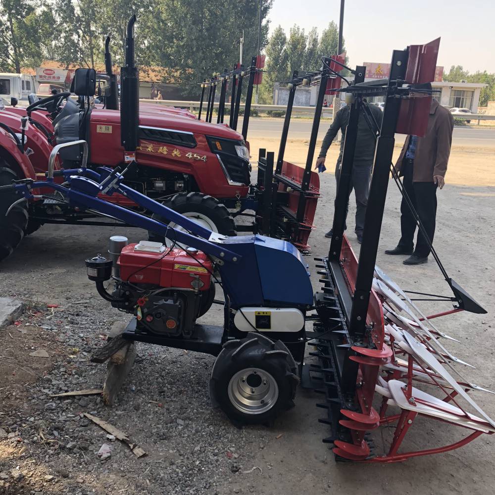 高4米芦苇收割机大马力山推拖拉机带割晒机