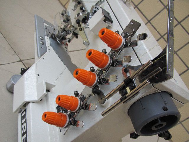 三针五线绷缝机服装打边机自动剪线冚车