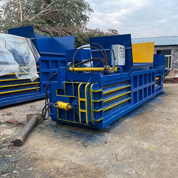 卧式压缩打包机自动上料纸箱废品压块机卧式废纸打包机图片