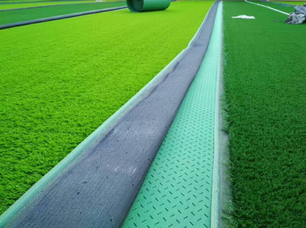 足球场草坪施工人造草坪铺设工程运动场地施工深圳市健宇体育