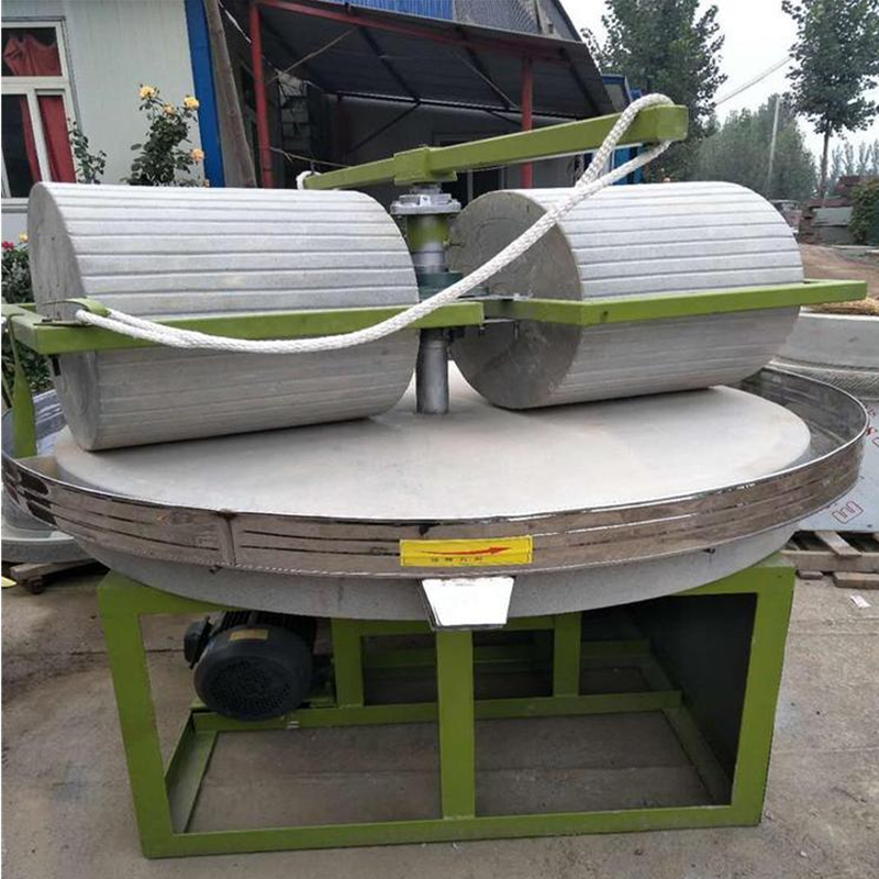 谷子小米脱皮碾米机三相电杂粮磨粉石碾子天然电动石碾子图片