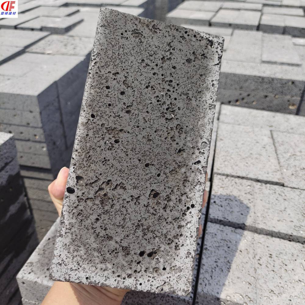 庭院铺装用火山岩板材100200登峰灰色火山石板天然黑洞石板