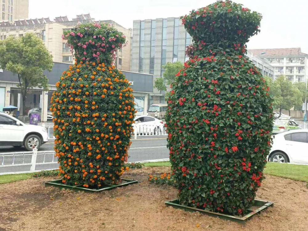 四川眉山菊花展造型绿雕成都绿雕厂雕塑小品定制