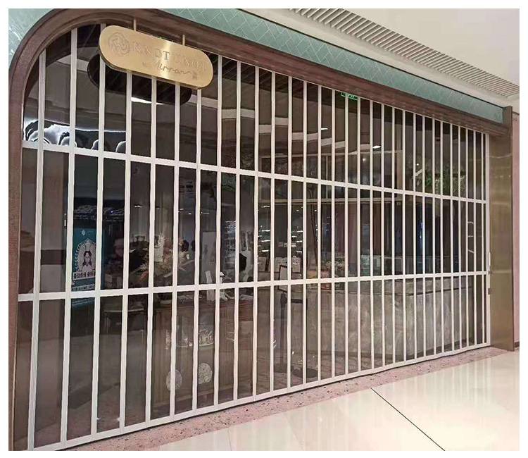 深圳折叠门厂家批发供应水晶折叠门商场汽车美店透明弧形横向推拉门