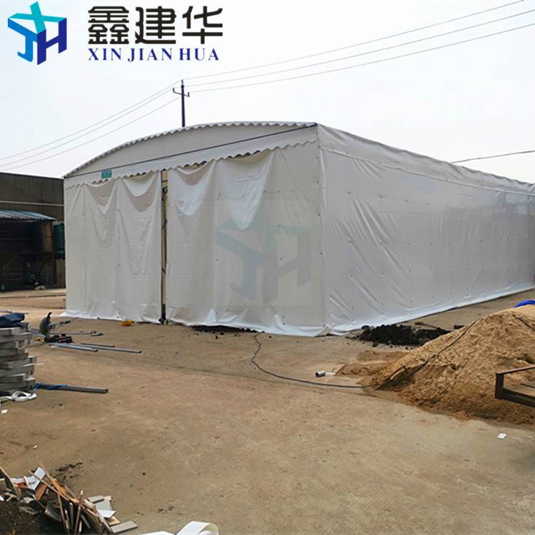 张家口怀安钢管仓库推拉棚 屋顶雨棚上门安装