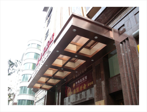 东方五星办公楼玻璃门头雨棚安装厂家