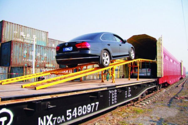 新能源汽车出口俄罗斯进口汽车河南铁桥国际新能源汽车运输代理铁路笼