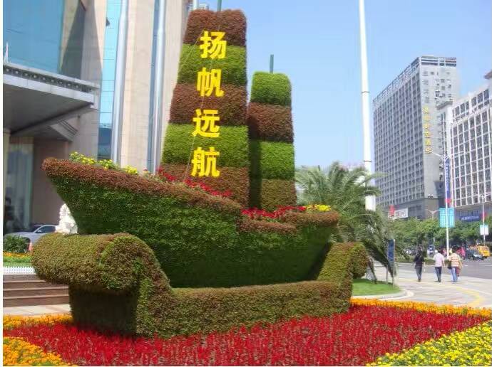 陕西铜川一帆风顺船造型绿雕成都雕塑摆件定制