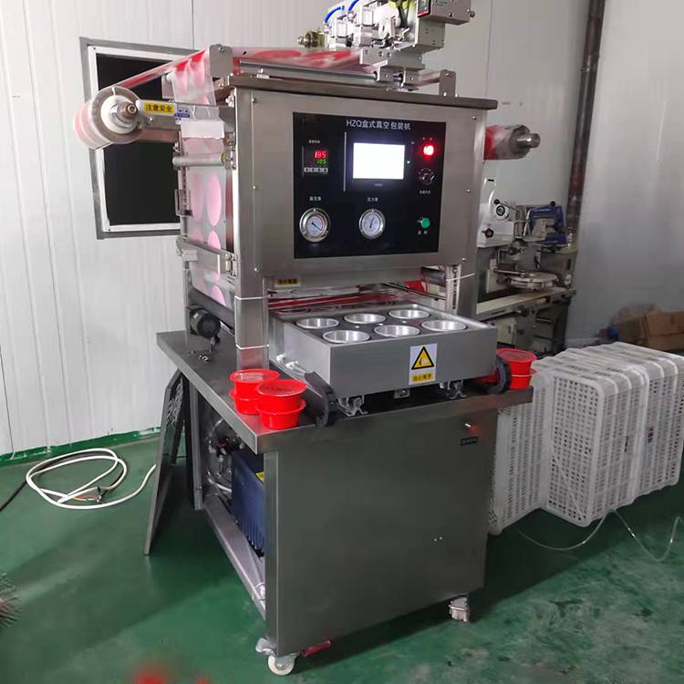 保鲜气调真空封碗机全自动连续肉丸包装机顺亨一出六机械