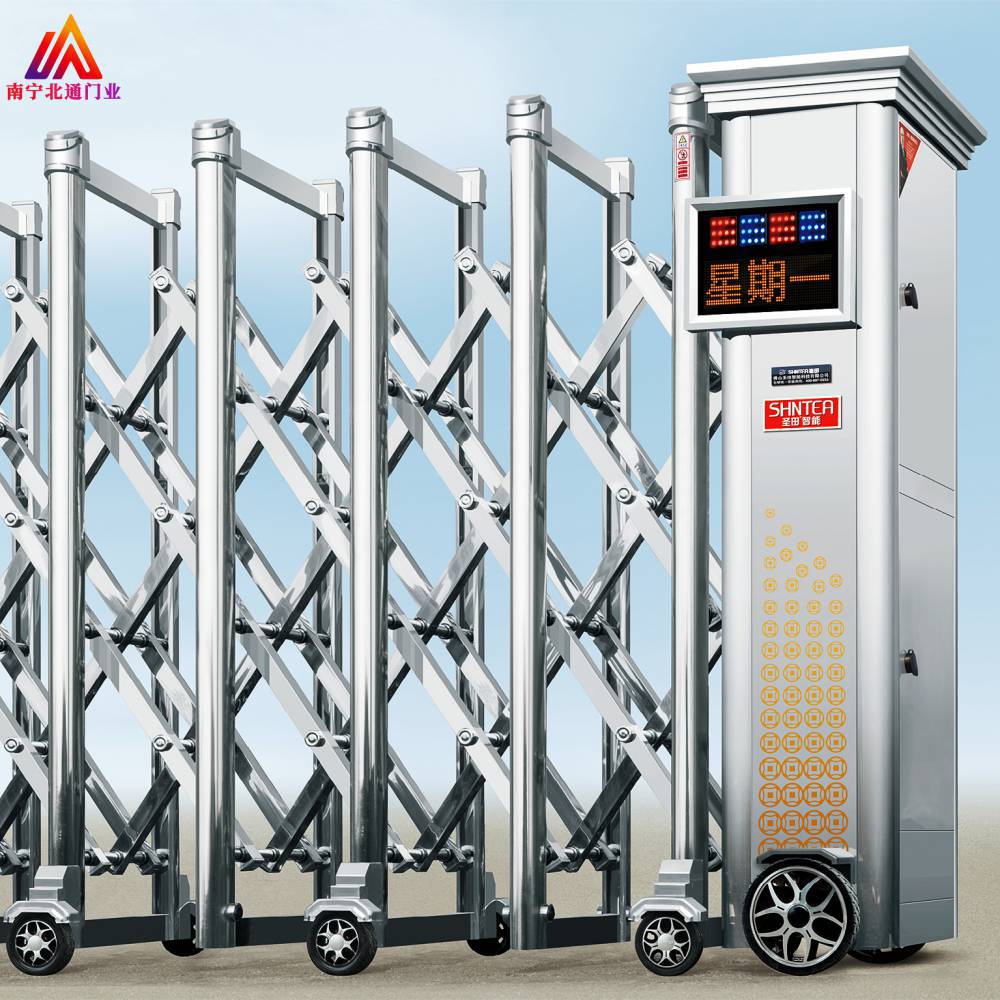 白钢伸缩门 小区成品收缩门 实力***工厂南宁北通门业是一家生产电动