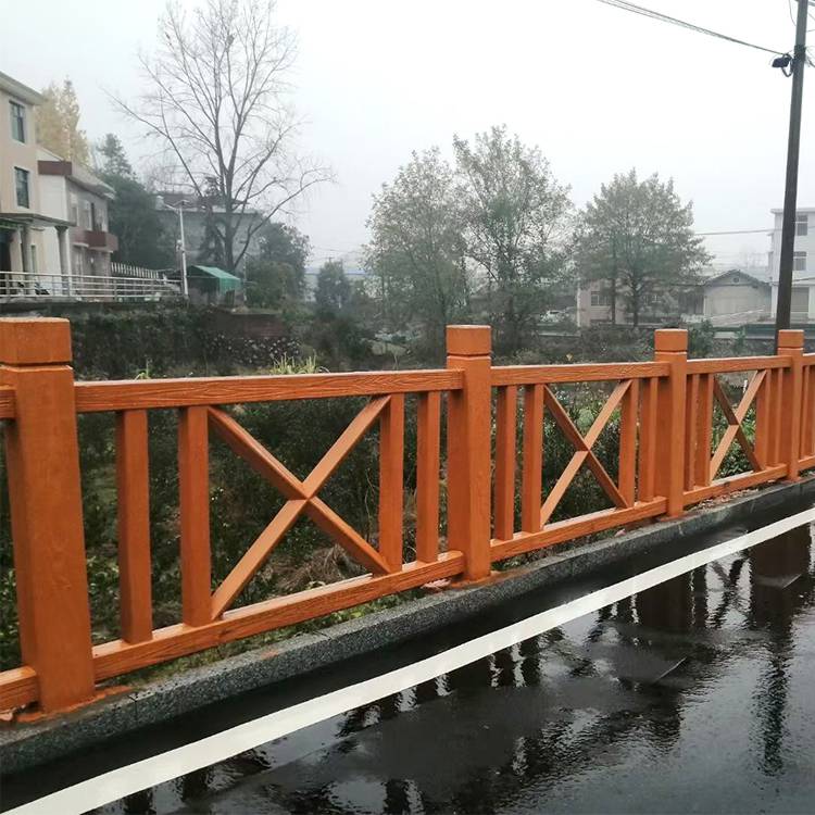 云南临沧市仿树桩石水泥仿木栏杆艺高景观仿石围栏仿树皮梯形护栏