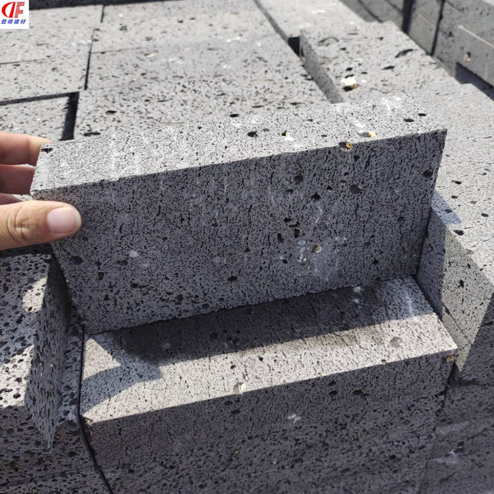 庭院铺装用火山岩板材100200登峰灰色火山石板天然黑洞石板