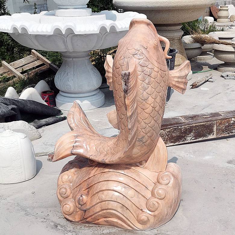 石雕鱼晚霞红鲤鱼雕塑鱼跃龙门雕刻大型石雕鱼雕刻厂家定做修复