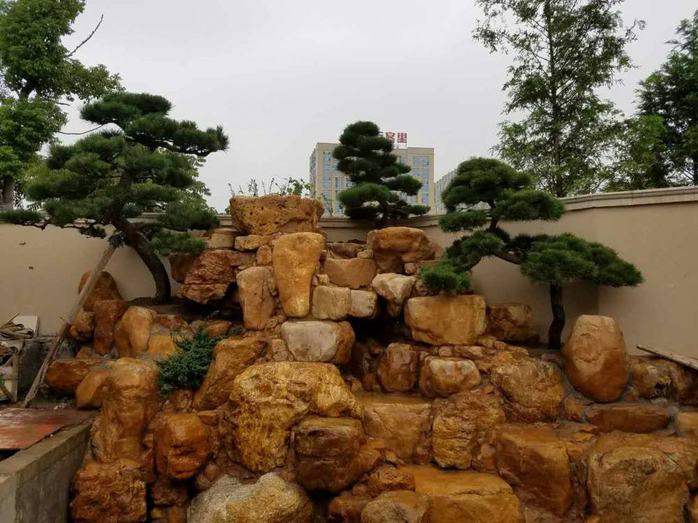 黄蜡石庭院鱼池假山驳岸