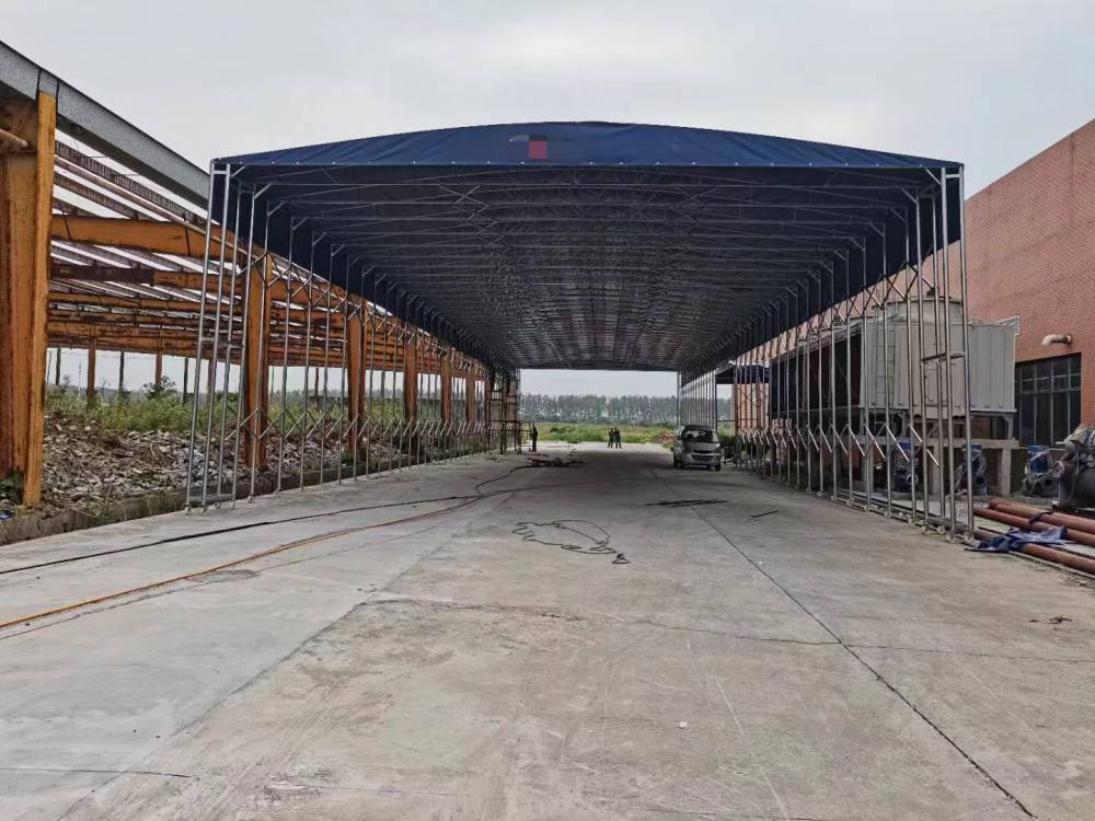 江苏淮安大型电动推拉棚厂房屋顶伸缩雨棚物流园临时仓储堆货折叠雨篷