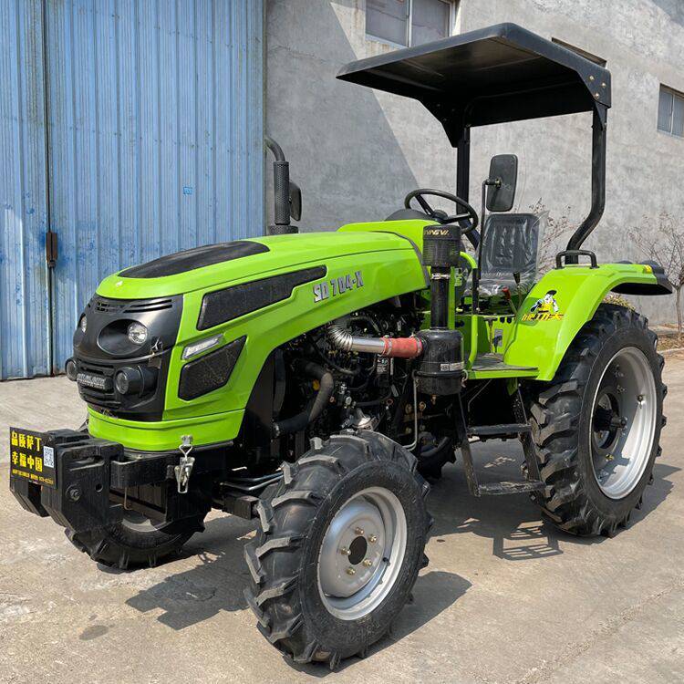 果园侧坐耕整四轮拖拉机农田四驱耕田机翻土犁地四驱拖拉机