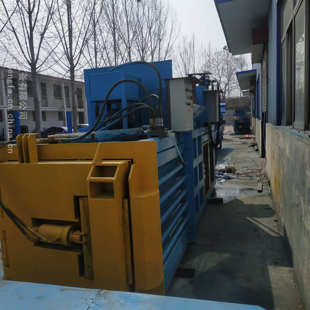 恒发废纸打包机全自动卧式打包机废旧服装卧式废纸压块机图片