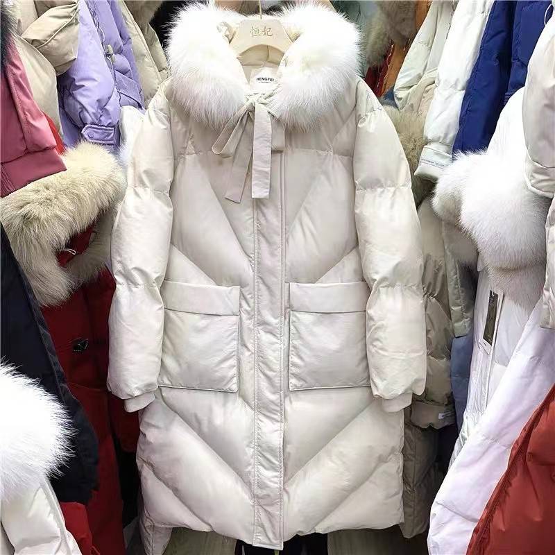 江苏连云港棉衣女中长大毛领韩版百搭基本款针织衫女库存2元服装批发市场