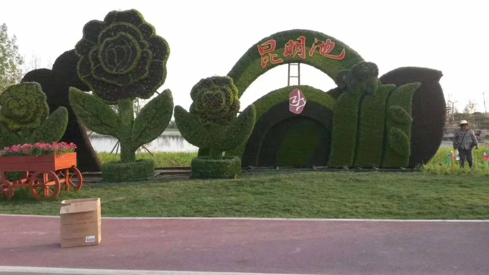陕西汉中球形造型绿雕成都凤凰绿雕图片
