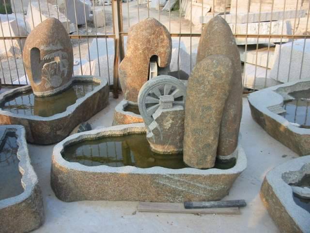 惠安海亨石业供应景观石雕流水摆件别墅庭院小区雕刻景观水车流水摆件