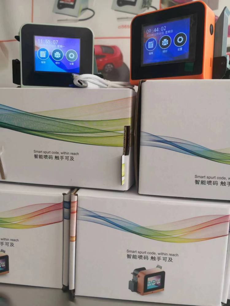 铭腾迷你手持喷码机 小型凹凸曲面打码机 瓶子罐子打码机