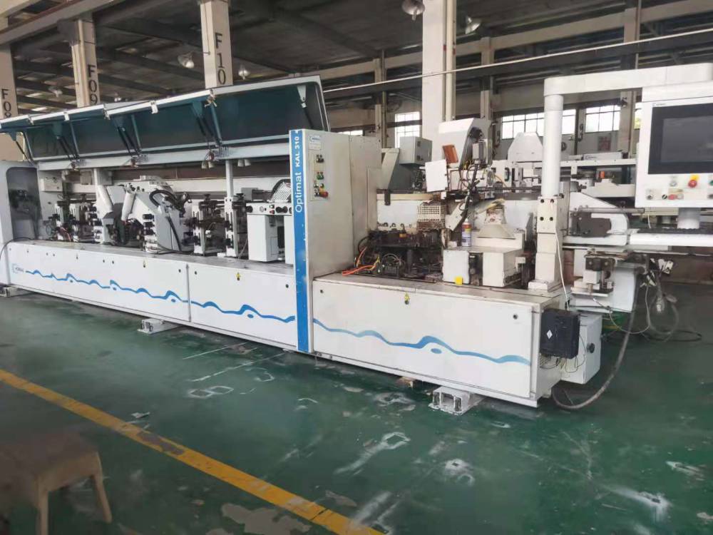 出售二手板式家具设备豪迈310全自动直线封边机高速重型全自动封边机