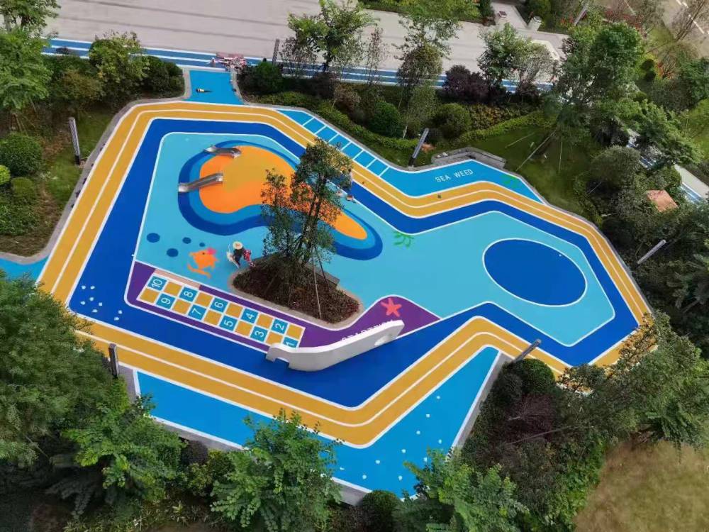 玉林兴业epdm幼儿园游乐场地塑胶透气型跑道施工工程