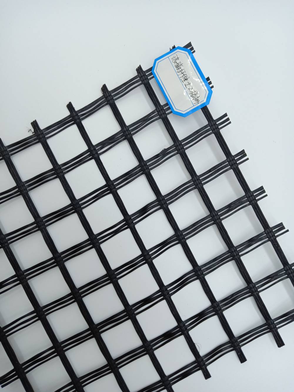 玻纤格栅厂家沥青路面玻纤土工格栅自粘式玻纤格栅图片
