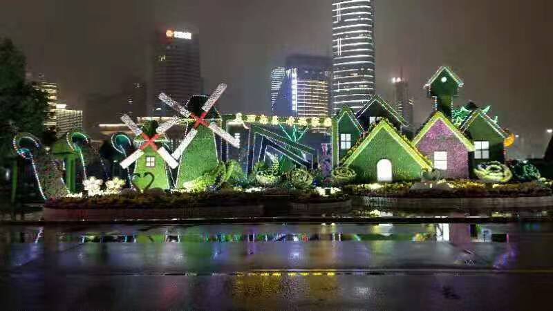 四川资阳灯笼造型绿雕建筑物入口仿真绿雕定制
