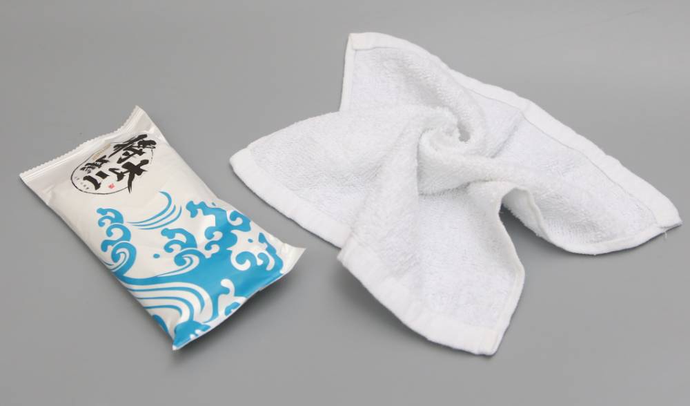 一次性湿毛巾定制酒店饭店消毒清洁单片湿毛巾定制logo厂家