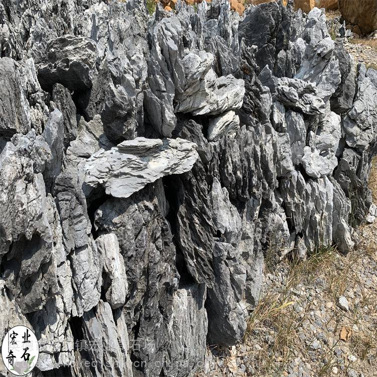 广东峰石制造驳岸假山造景-别墅庭院景观峰石假山设计