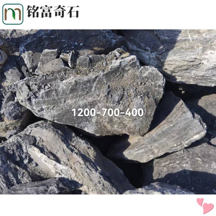 一吨黑山石一百八左右，黑山石重量过吨位，福建黑山石草坪点缀