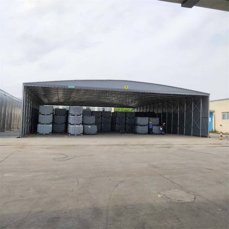 货物堆放移动推拉仓库伸缩雨棚防风抗风鑫建华