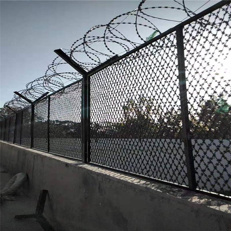 湖南长沙 金属刀刺网 监狱隔离防护网 围墙加高钢网墙