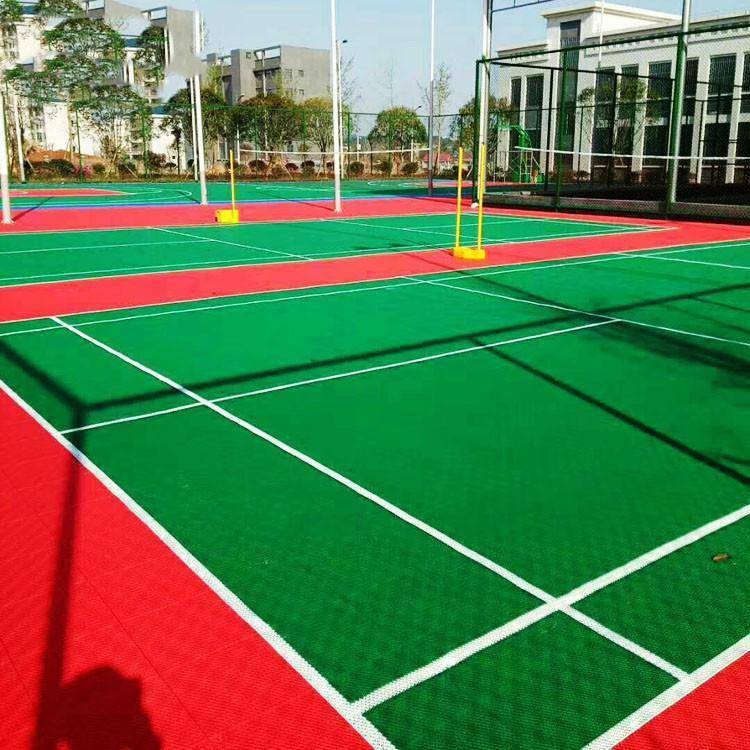 亿傲泰体育公园地面铺设epdm塑胶硅pu球场材料图片