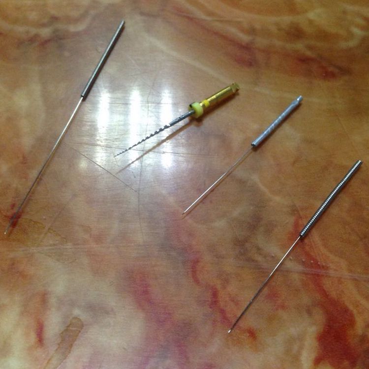 科技东莞生产针灸针磨尖机乌针磨针机全自动磨尖机等设备