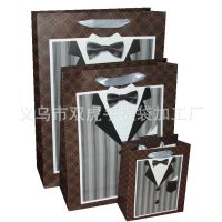 品牌男式西服服装专柜***手提纸袋 定做铜板纸白卡纸特种纸袋子