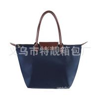 义乌工厂供应多功能尼龙包女包通勤沙滩包收纳包折叠购物袋手拎包