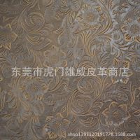 壓花頭層牛皮***面料浮雕紋瘋馬復(fù)古牛皮現(xiàn)貨供應(yīng)低價批發(fā)拿樣