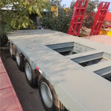 六线十二轴钩机板半挂车 鸿盛业骏牌 重型低平板液压升降高低板半挂车 HTD9438