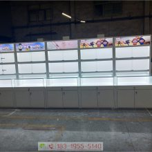 湖南湘潭化妆品展示柜/铁加木结合眼镜陈列柜品牌代理