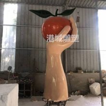 文旅小镇手托柑桔标识玻璃钢柑橘蜜桔砂糖桔雕塑像