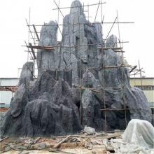 深圳塑石假山设计制作 千层石护坡流水假山 小区假山厂家制作