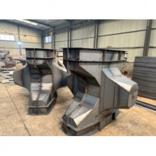 从方寸模具到万里浪墙：扭王字块的“硬核诞生记