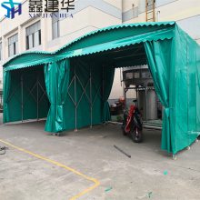 山东鑫建华订做电动伸缩雨篷图片 仓库雨棚布 青岛悬空式推拉雨蓬用的什么材料