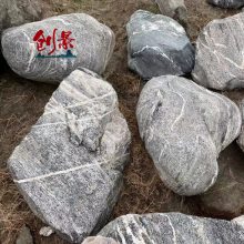 珠海泰山石厂家供应，枯山水造景雪浪石案例，草坪点缀假山景观石