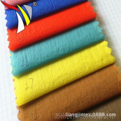 【苏州良锦纺织】厂家直 现货供应380T 低弹尼丝纺 羽绒服面料